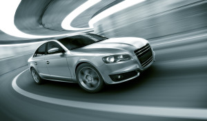 Car driving fast in tunnel